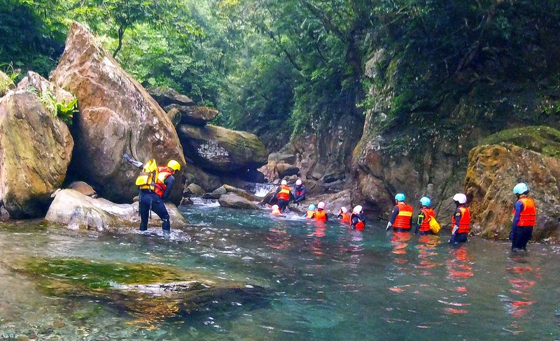 River Tracing and Rock Diving Experience at Jinyue Waterfall