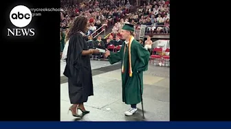 Paralyzed high school student Nobel Haskell walks to accept diploma l WNT